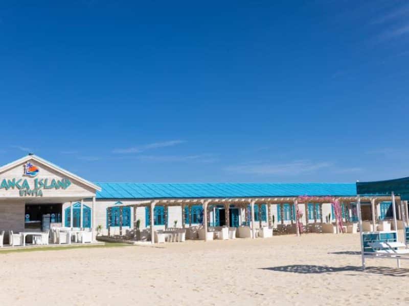 Bianca Island Utopia snorkeling tour with vibrant coral reefs, beach relaxation, and foam party fun in the Red Sea near Hurghada.